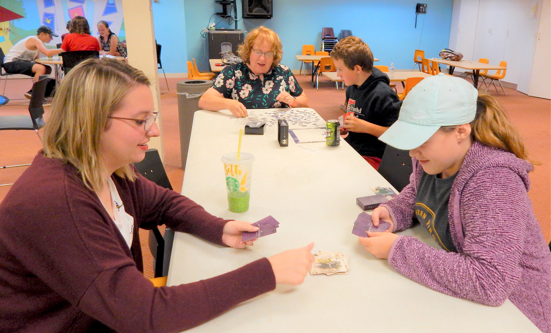 Teens play table games
